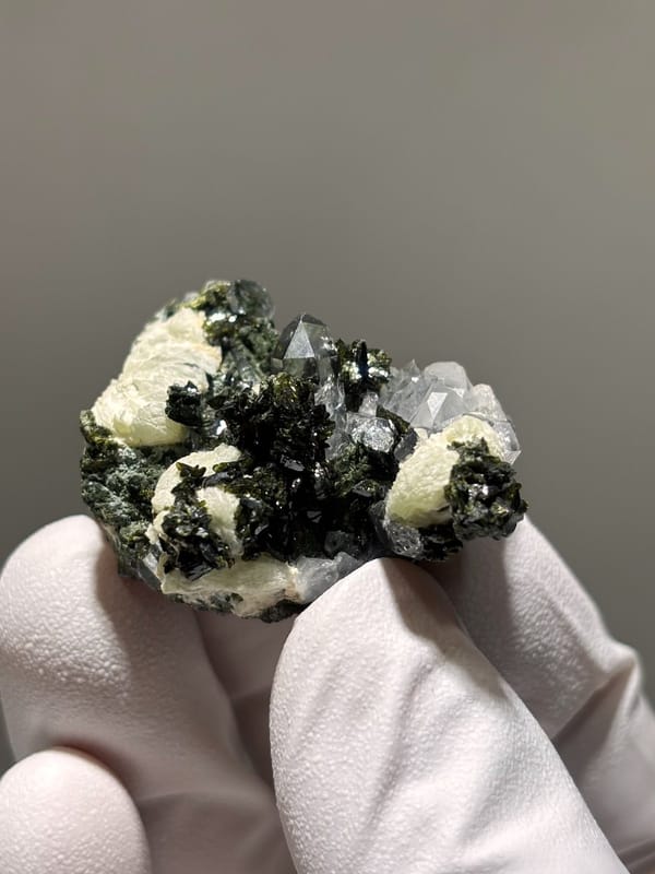 Dark epidote with clear quartz and pale prehnite from Yunnan, China