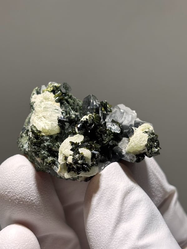 Dark epidote with clear quartz and pale prehnite from Yunnan, China, view 2 of 6