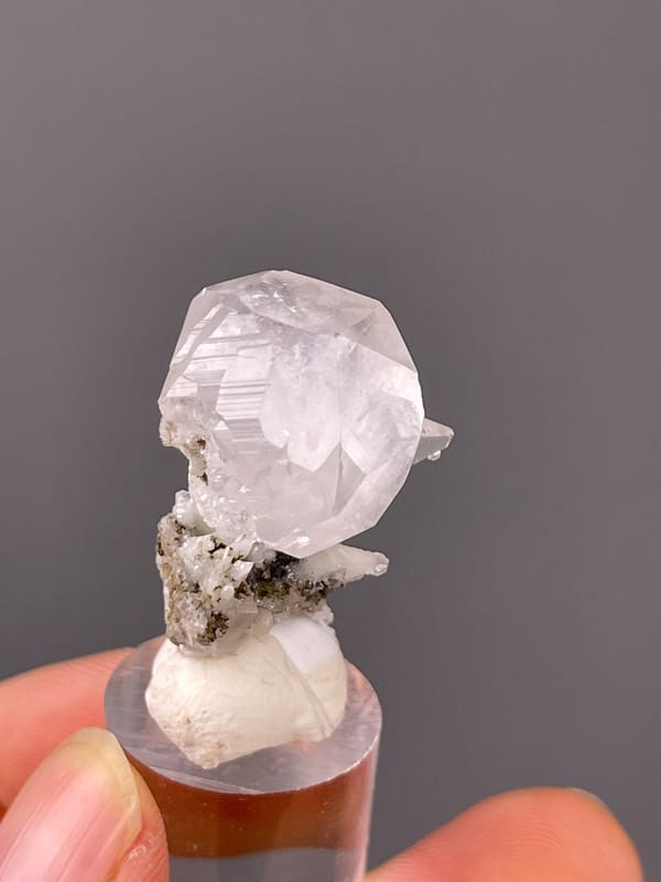 Colorless complex calcite crystal on natural calcite specimen from Hubei, China