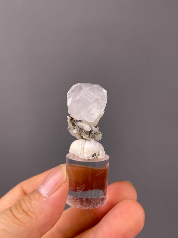 Calcite specimen from Hubei, China bearing colorless complex calcite crystal