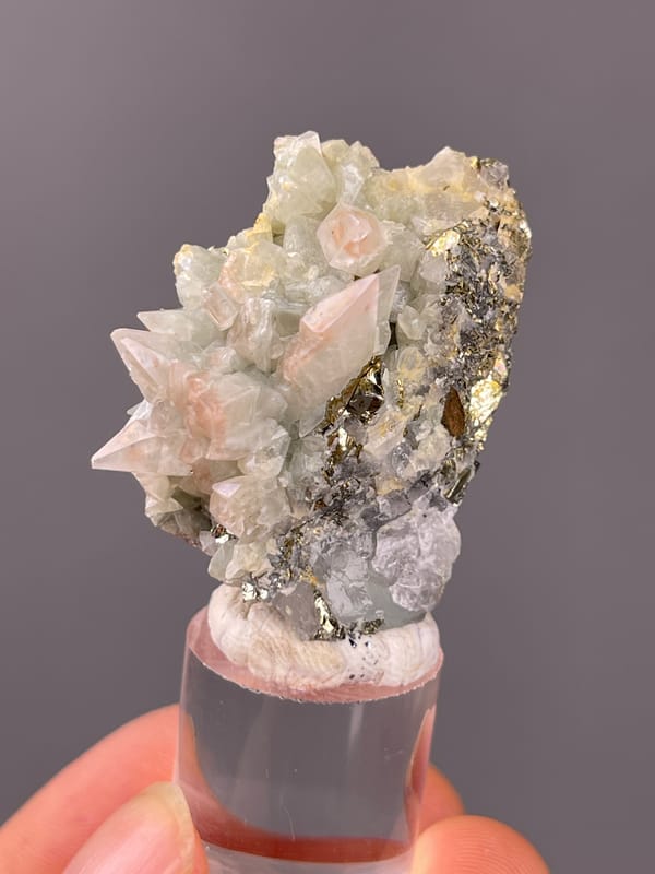 Dogtooth Calcite specimen from Daye, Hubei, China featuring pale green and pink calcite crystals