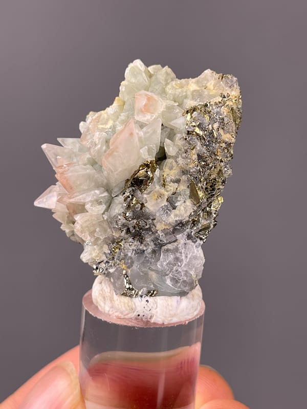 Dogtooth Calcite specimen from Daye, Hubei, China, defined by pale green and pink calcite crystals