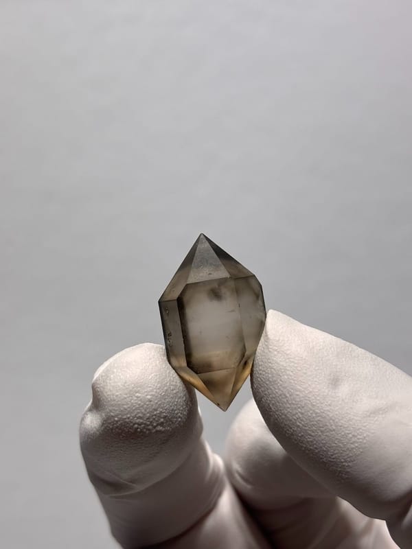 Tiny smoky double-terminated quartz with phantom from Yunnan, China