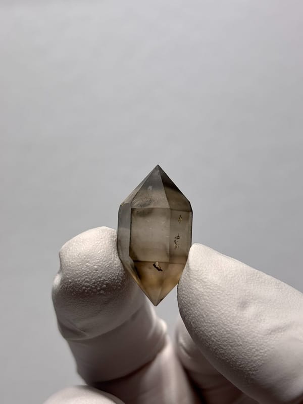 Tiny smoky double-terminated quartz with phantom from Yunnan, China, view 3 of 8