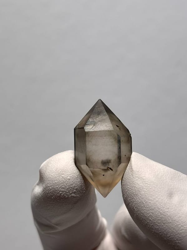 Tiny smoky double-terminated quartz with phantom from Yunnan, China, view 5 of 8