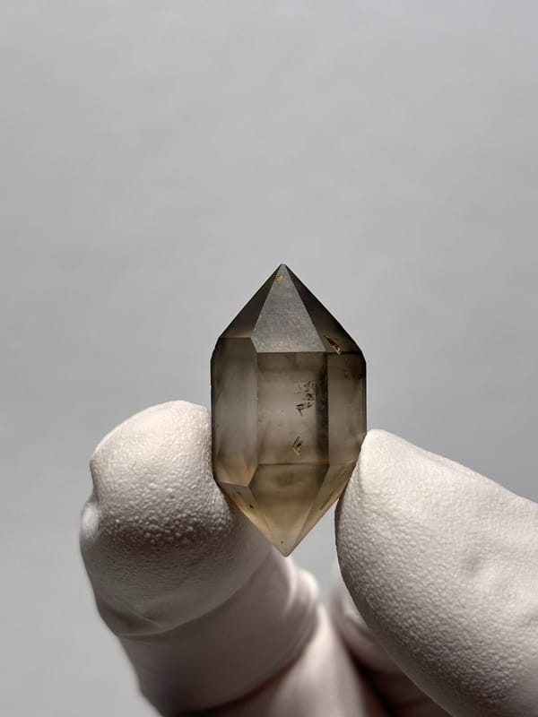 Tiny smoky double-terminated quartz with phantom from Yunnan, China, view 7 of 8