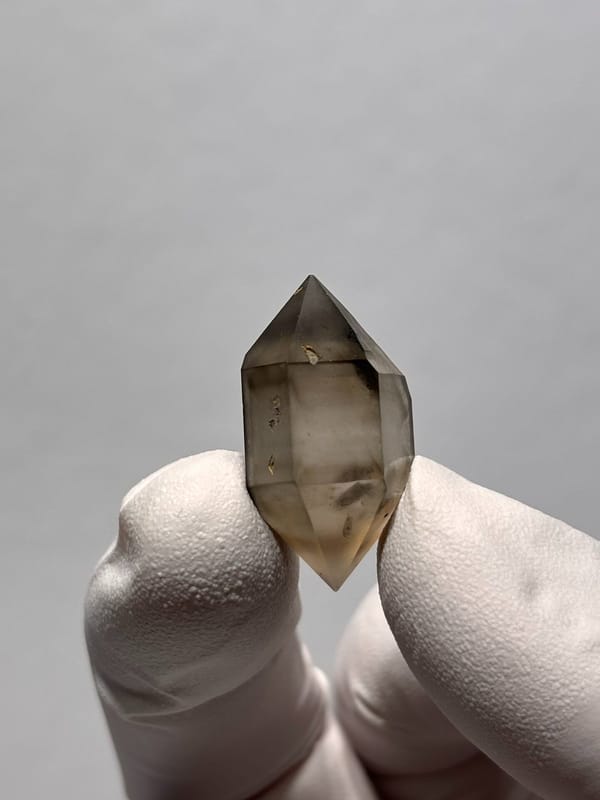 Tiny smoky double-terminated quartz with phantom from Yunnan, China, view 8 of 8