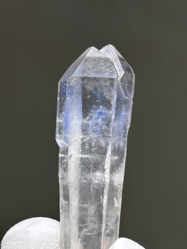 Blue dumortierite-in-quartz double-terminated wand from Brazil