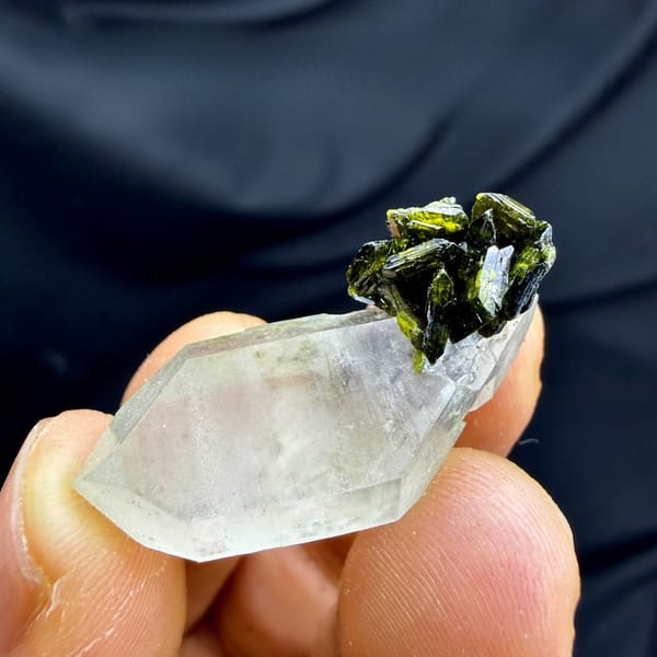 Double-terminated quartz with green epidote cluster from Sichuan, China