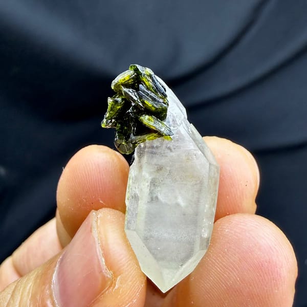 Double-terminated quartz with green epidote cluster from Sichuan, China, view 5 of 6