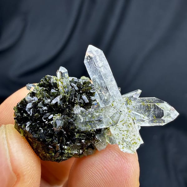 Clear quartz points on dark green epidote from Sichuan, China, view 3 of 6