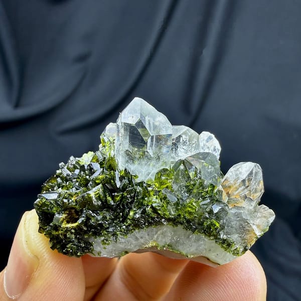 Transparent quartz points on dark green epidote from Sichuan, China