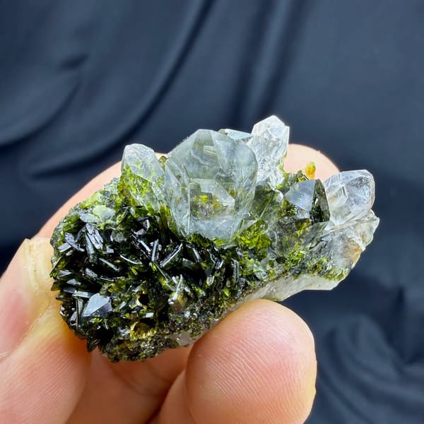 Transparent quartz points on dark green epidote from Sichuan, China, view 2 of 6