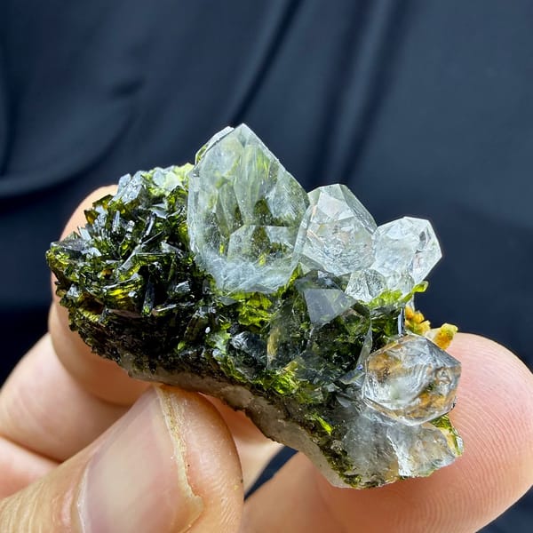 Transparent quartz points on dark green epidote from Sichuan, China, view 3 of 6