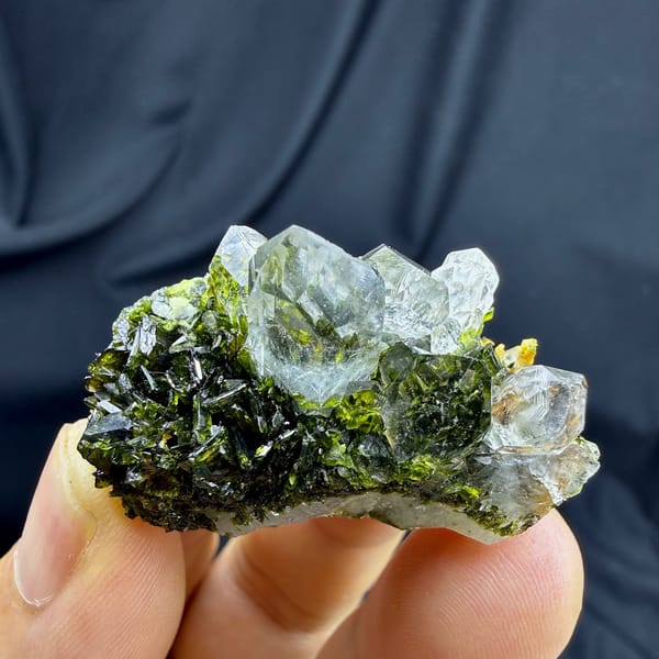 Transparent quartz points on dark green epidote from Sichuan, China, view 4 of 6