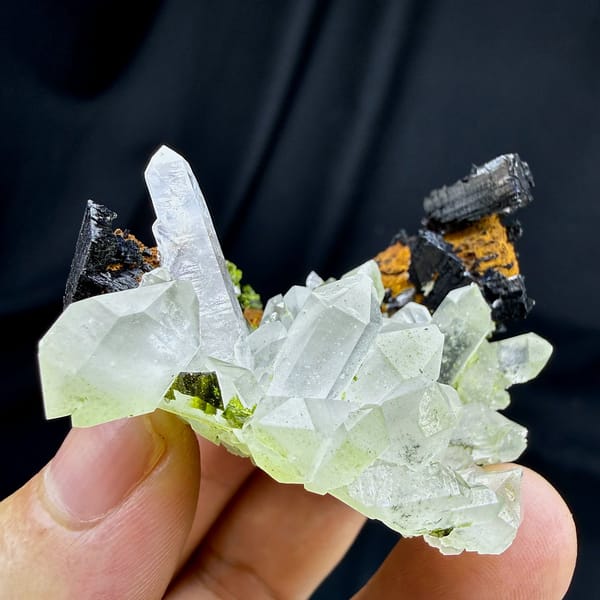 Clear quartz cluster with black babingtonite and epidote from Sichuan, China, view 3 of 6