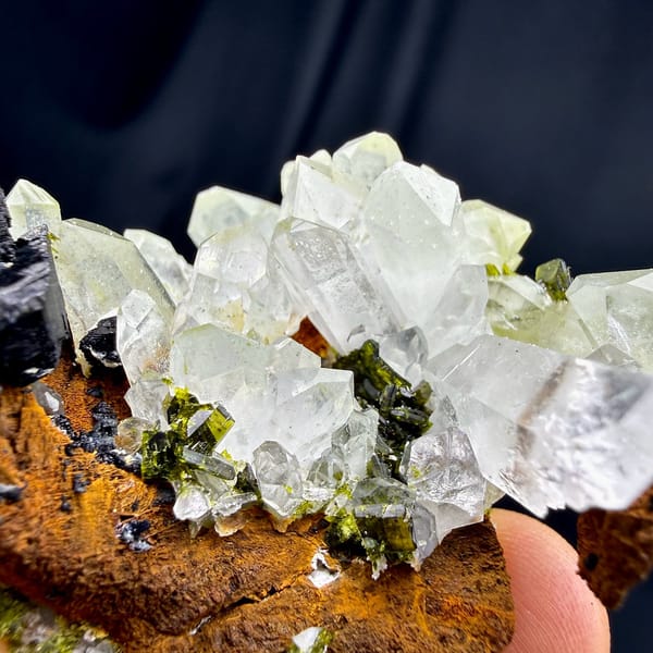 Clear quartz cluster with black babingtonite and epidote from Sichuan, China, view 5 of 6
