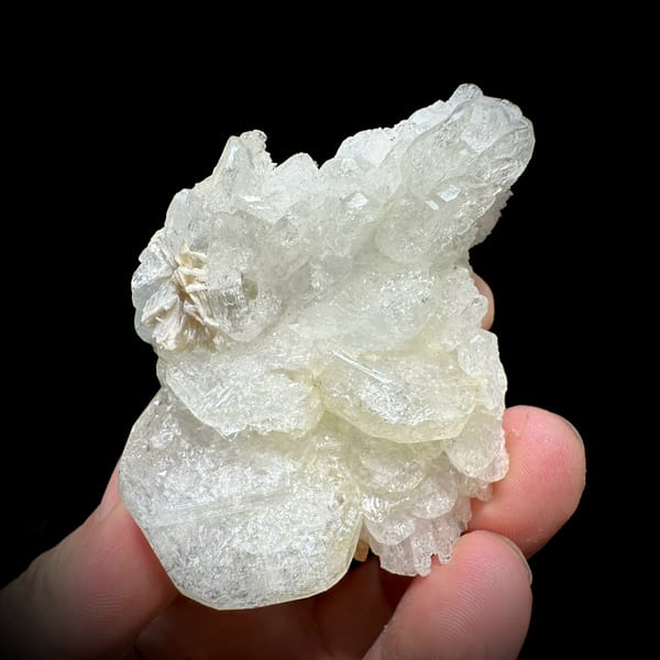 Etched hollowed aquamarine crystal with mica and scheelite from Xuebaoding, Sichuan, China, second angle