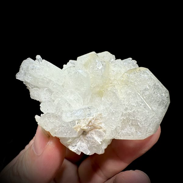 Etched hollowed aquamarine crystal with mica and scheelite from Xuebaoding, Sichuan, China, reverse side