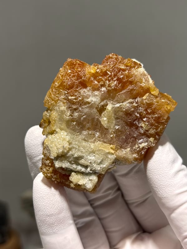 Etched honey scheelite with mica imprints from Xuebaoding, Sichuan, China, second angle
