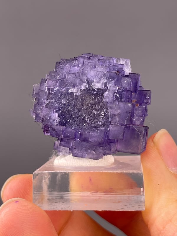 Etched Stepped Purple Fluorite specimen from Xinjiang, China featuring etched stepped purple cubes