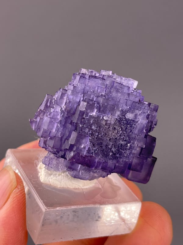 Etched Stepped Purple Fluorite specimen from Xinjiang, China displaying etched stepped purple cubes