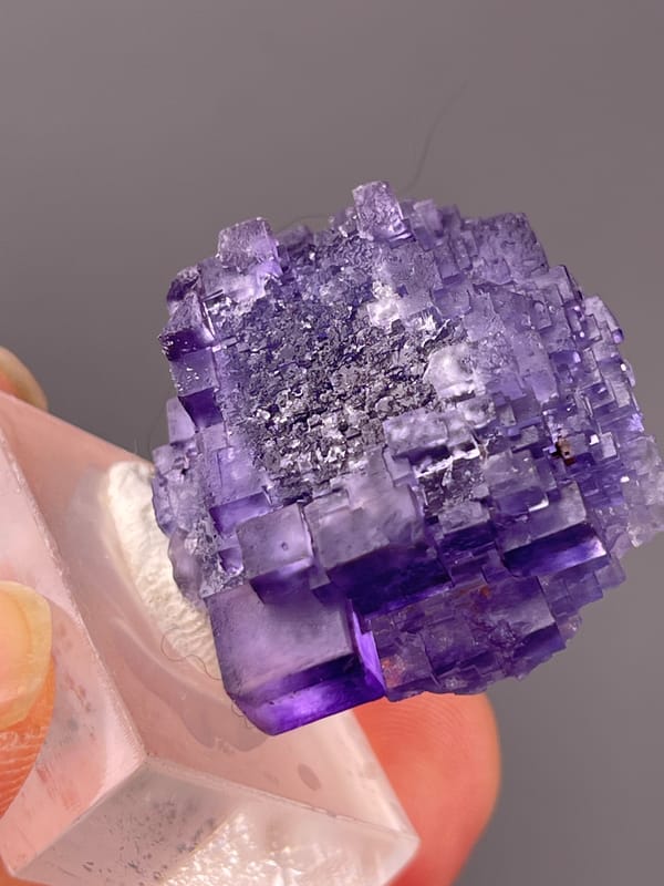 Etched Stepped Purple Fluorite specimen from Xinjiang, China highlighting etched stepped purple cubes