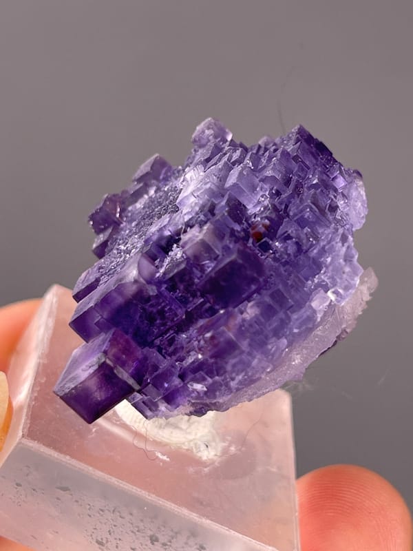 Etched Stepped Purple Fluorite specimen from Xinjiang, China, characterized by etched stepped purple cubes