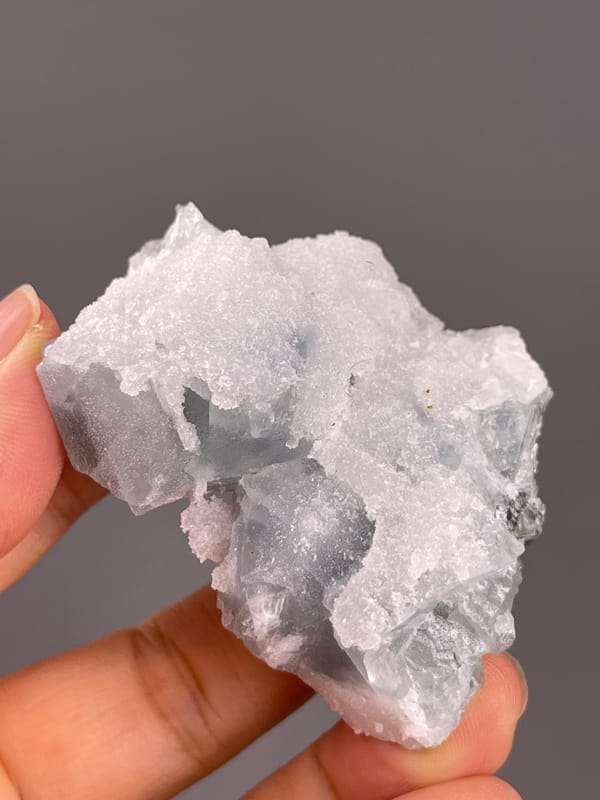 Fluorite from Fujian, China: oblique view of exposed blue-gray faces.