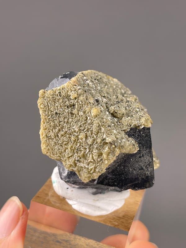 Fluorite from Fujian, China: back surface covered in pale granular crystals.