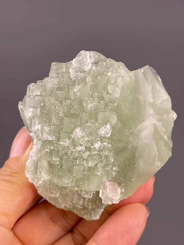 Fluorite from Fujian, China: upright side showing stacked stepped outlines.
