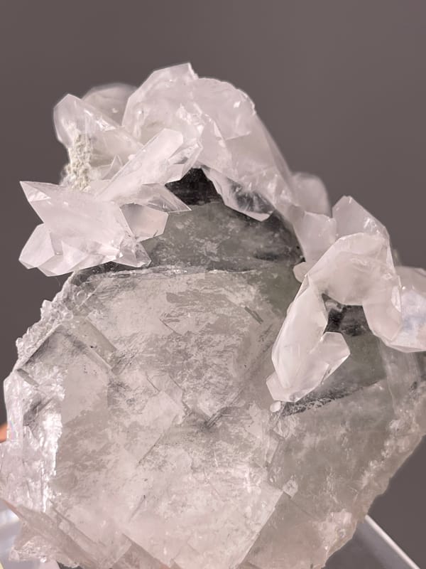 Gray calcite with white overgrowth visible on Fluorite with Calcite specimen from Fujian, China