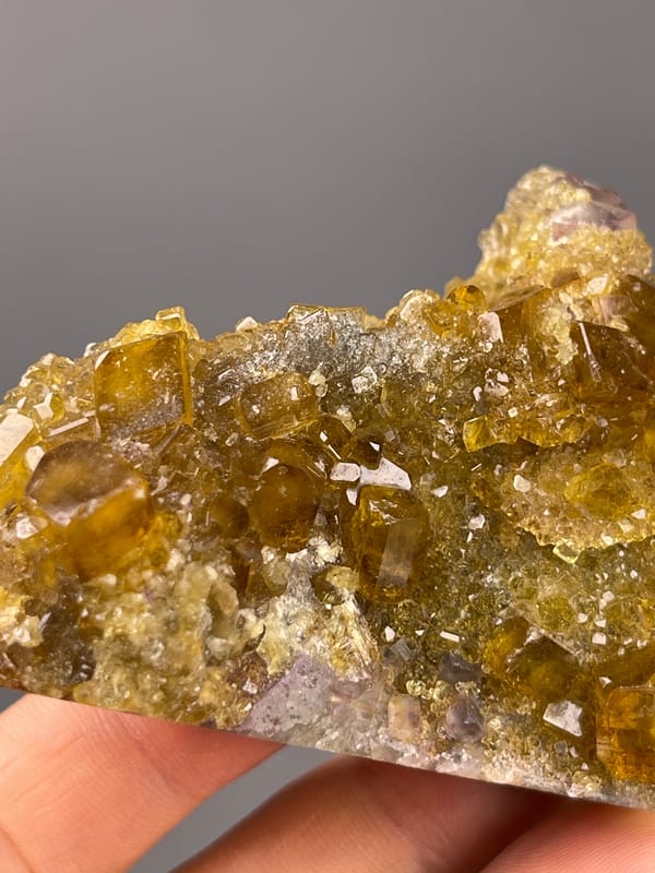 Fluorite with Yellow Barite specimen from Jiangxi, China displaying honey-yellow barite crystals on fluorite
