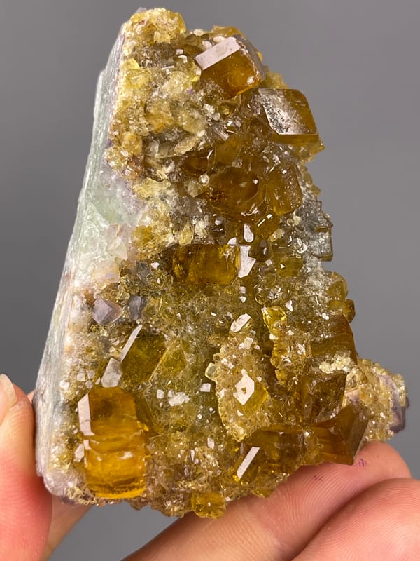 Fluorite with Yellow Barite specimen from Jiangxi, China highlighting honey-yellow barite crystals on fluorite