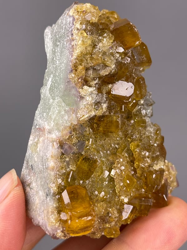 Fluorite with Yellow Barite specimen from Jiangxi, China bearing honey-yellow barite crystals on fluorite