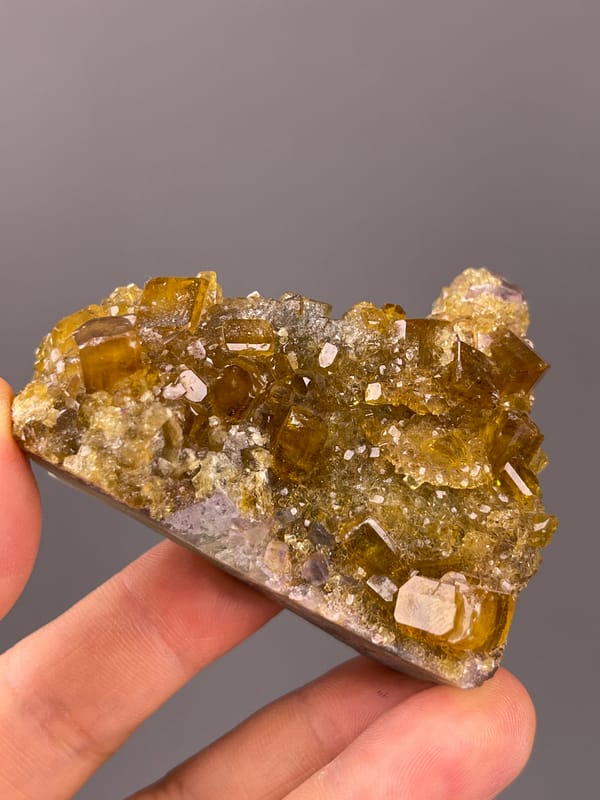 Fluorite with Yellow Barite specimen from Jiangxi, China set with honey-yellow barite crystals on fluorite