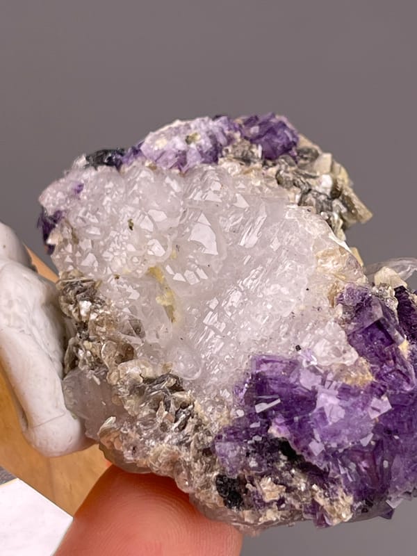 Fluorite from Yaogangxian, Hunan, China: close detail of pale quartz surrounded by mica.