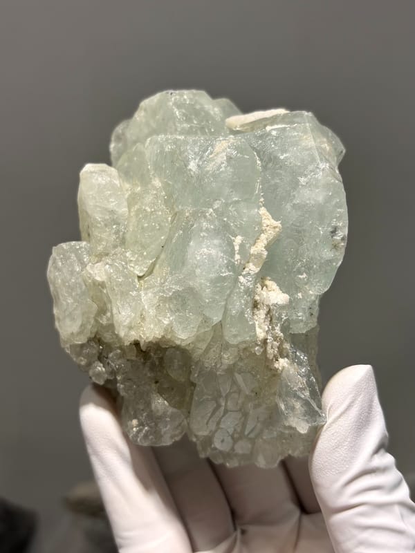 Frosted pale green aquamarine block from Xuebaoding, Sichuan, China, reverse side