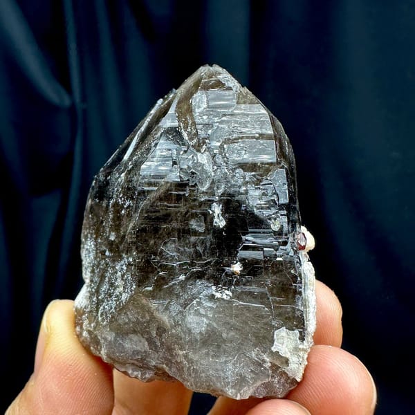 Large dark smoky quartz crystal with garnet and hyalite from Yunxiao, Fujian, China