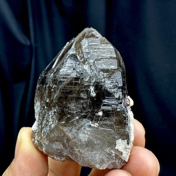 Large dark smoky quartz crystal with garnet and hyalite from Yunxiao, Fujian, China, view 6 of 6