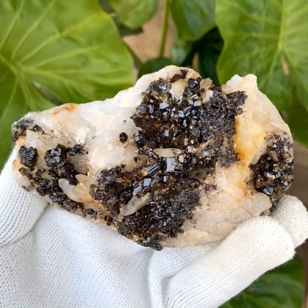 Plate of gemmy brown cassiterite on white quartz from Yunnan, China
