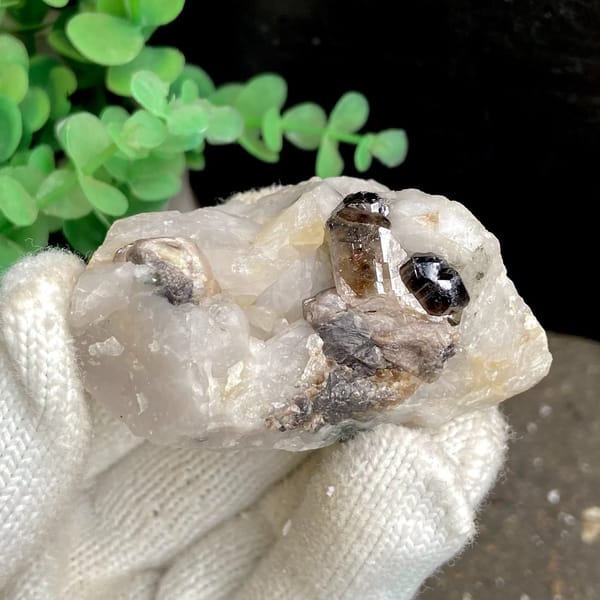 Gemmy brown cassiterite crystal on white quartz from Yunnan, China, view 6 of 9