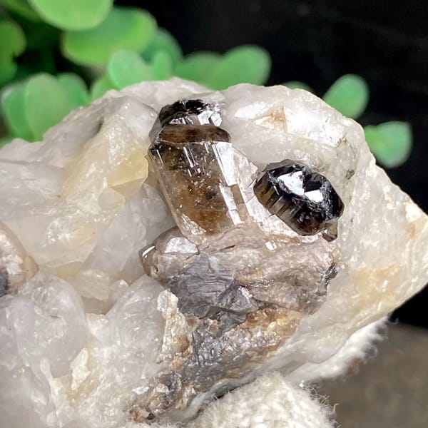 Gemmy brown cassiterite crystal on white quartz from Yunnan, China, view 9 of 9