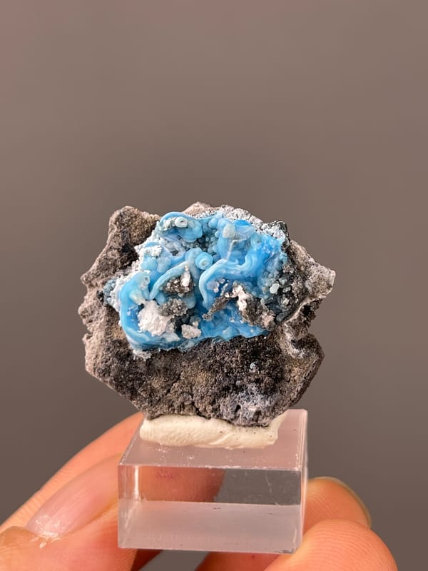 Gibbsite specimen from Guizhou, China featuring bright blue botryoidal cavity