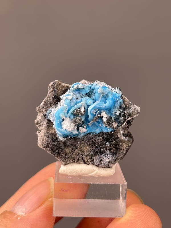 Gibbsite specimen from Guizhou, China showing bright blue botryoidal cavity
