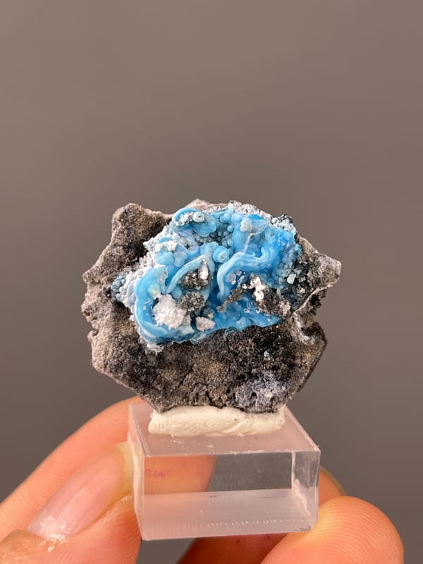 Gibbsite specimen from Guizhou, China, defined by bright blue botryoidal cavity