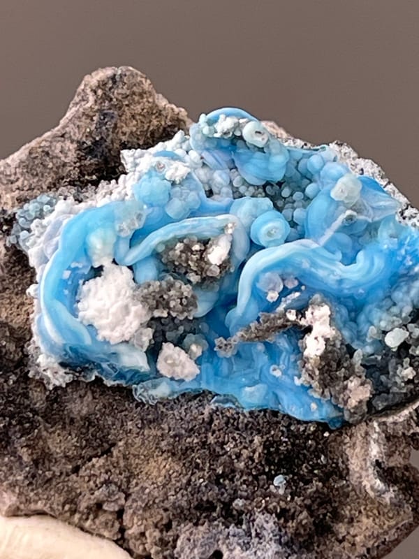 Bright blue botryoidal cavity on natural gibbsite specimen from Guizhou, China