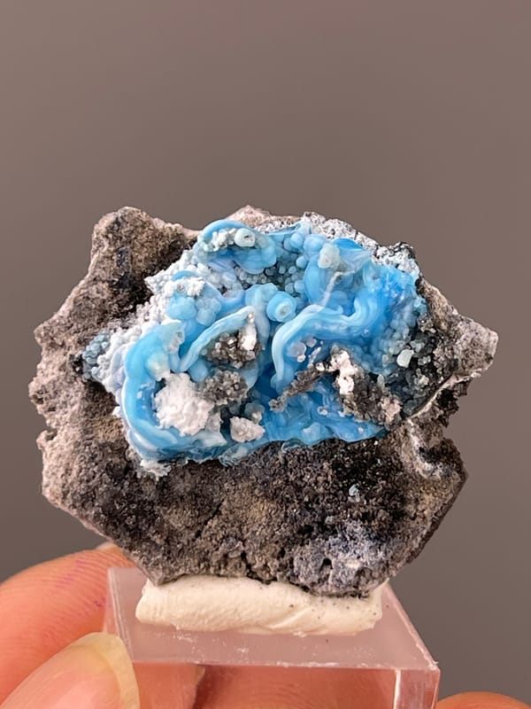 Gibbsite specimen from Guizhou, China, characterized by bright blue botryoidal cavity