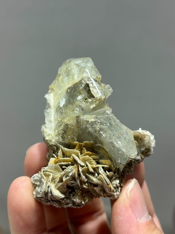 Glassy aquamarine with iridescent faces and mica from Xuebaoding, Sichuan, China, view 5 of 5