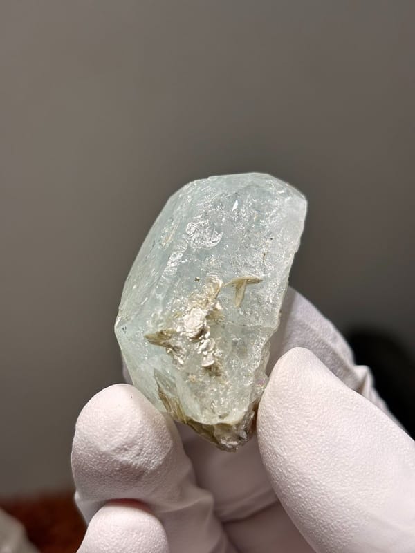 Glassy pale aquamarine with mica fleck from Xuebaoding, Sichuan, China